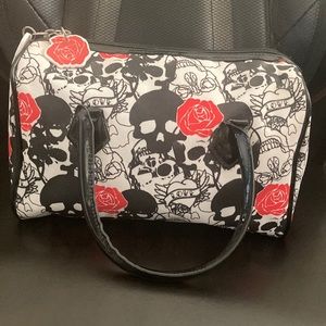 Black white and red purse